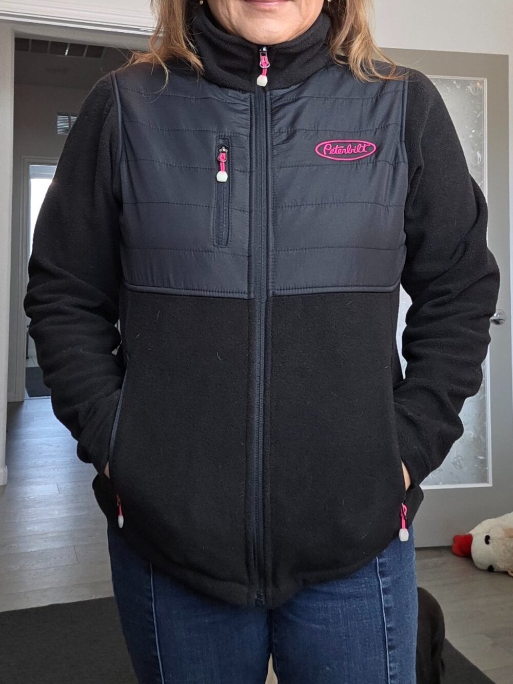 Peterbilt branded women's jacket with lots of zippers - size M